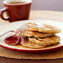 Multi-Grain Pancakes with Canadian Bacon and Maple Syrup